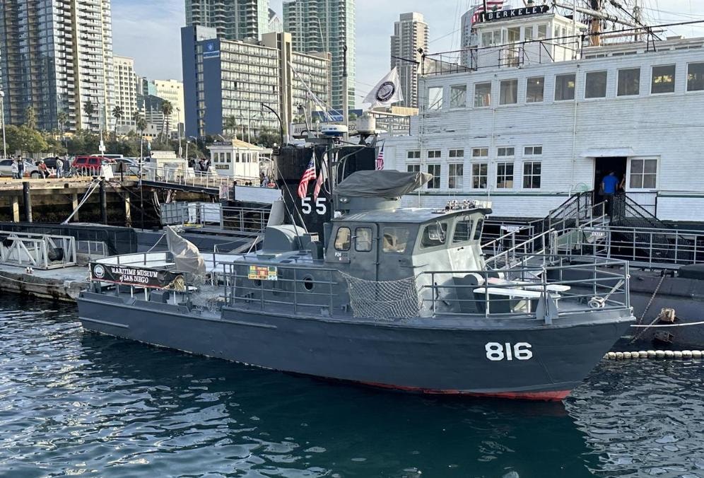 Maritime Museum of San Diego — historic military vessel PCF-816 docked at the waterfront viewed from private yacht charter