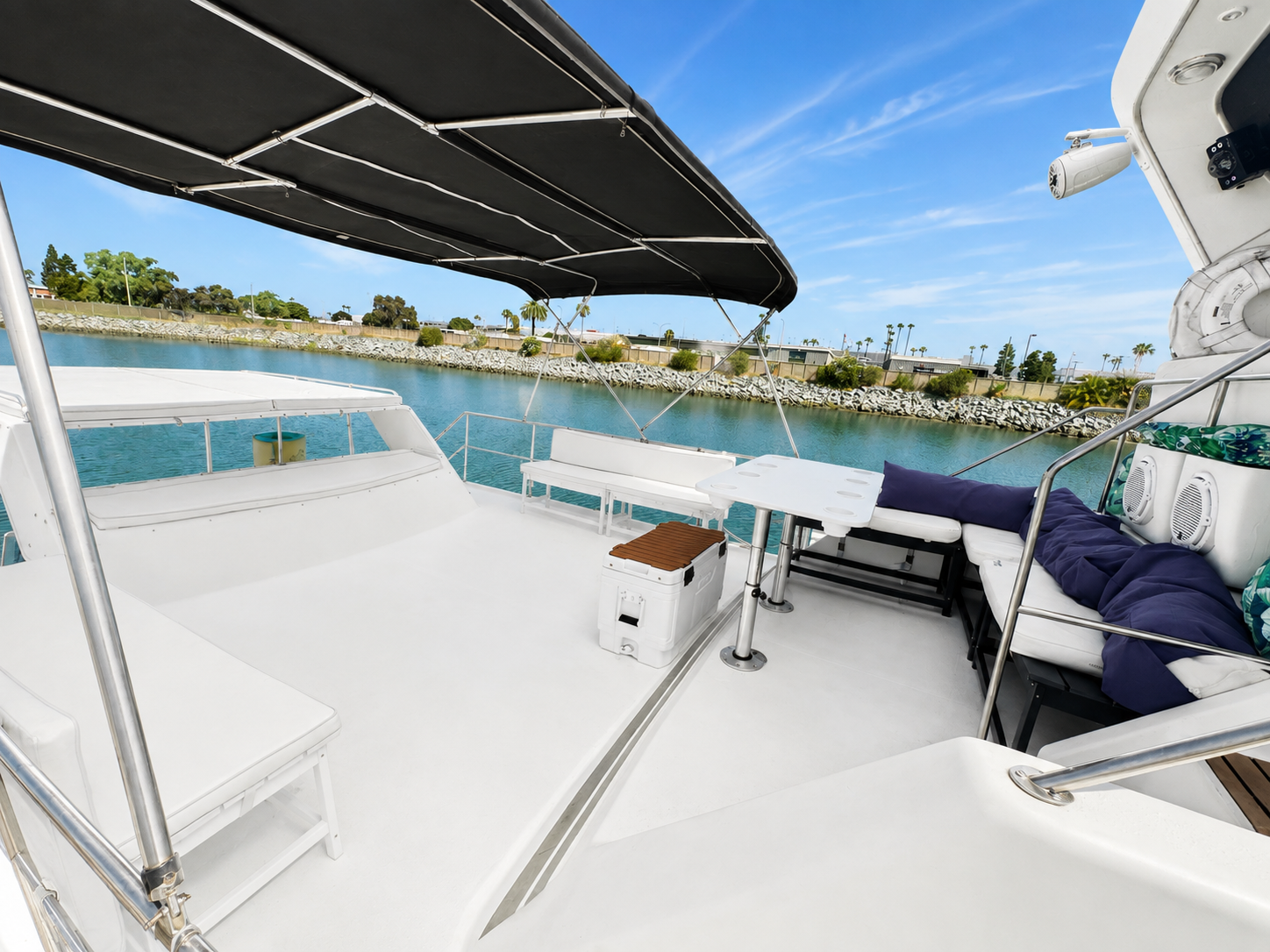 Yacht upper deck San Diego — spacious open deck with canopy and seating on the Paradise charter yacht