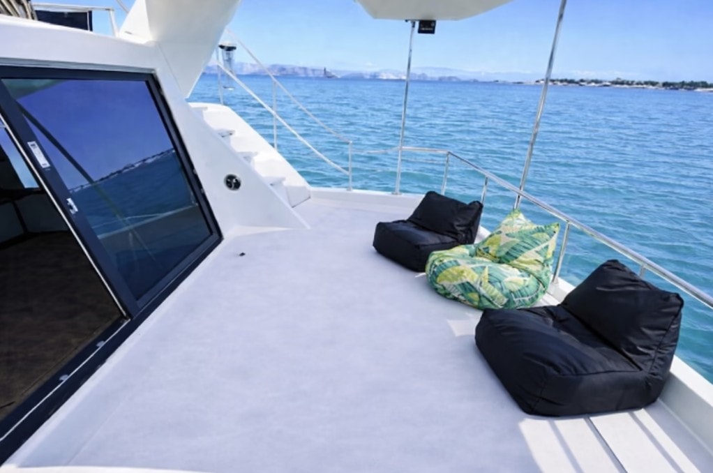 Yacht deck seating San Diego — bean bag lounge chairs on upper deck of private charter boat